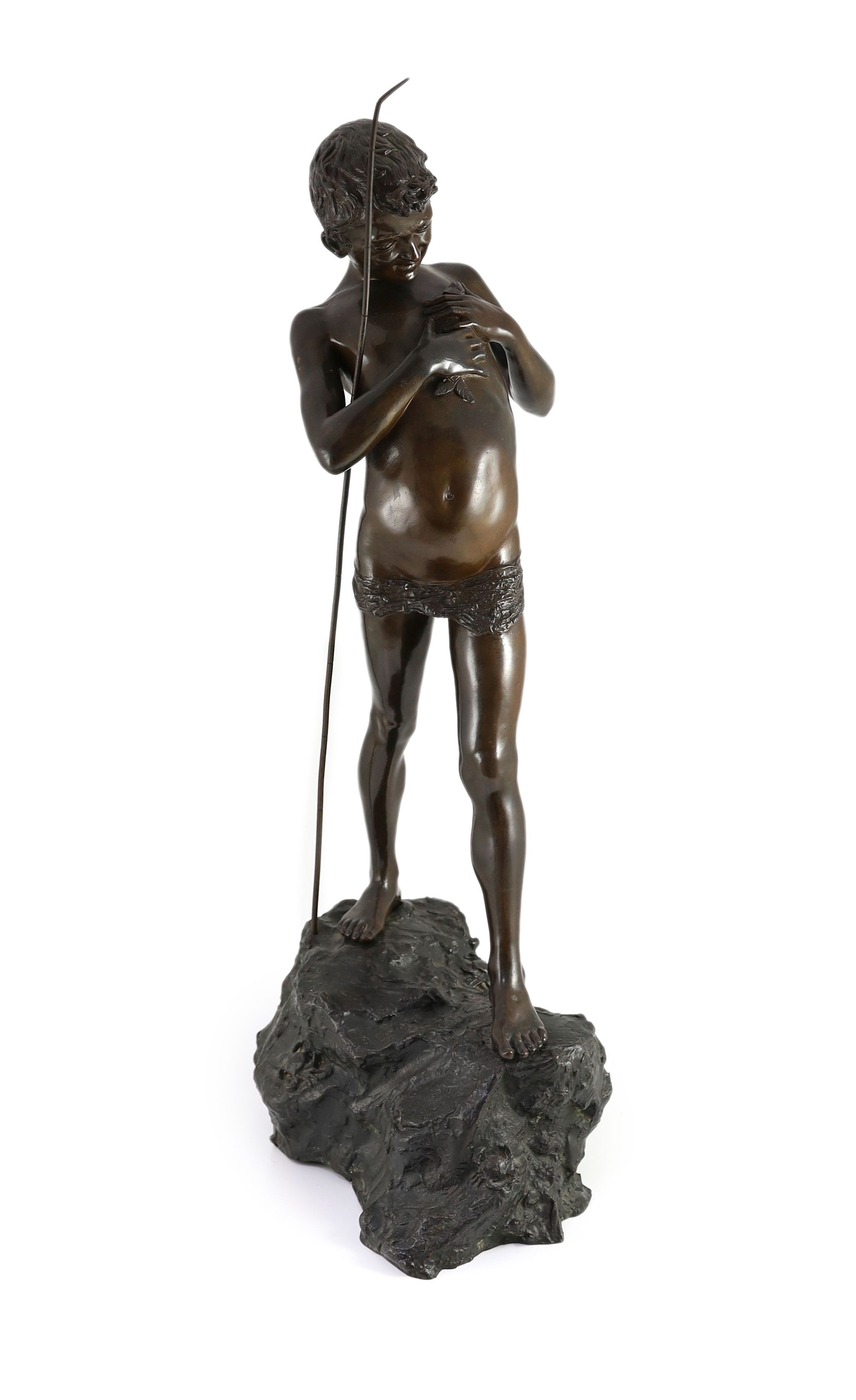 Giovanni Varlese (Italian, 1888-1922). A bronze figure of a fisherboy standing holding a fish to his chest, height 72cm